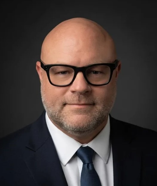 Professional headshot of Dwight Steele